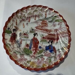 Vintage Ceramic Plate with Red and Gold Accents